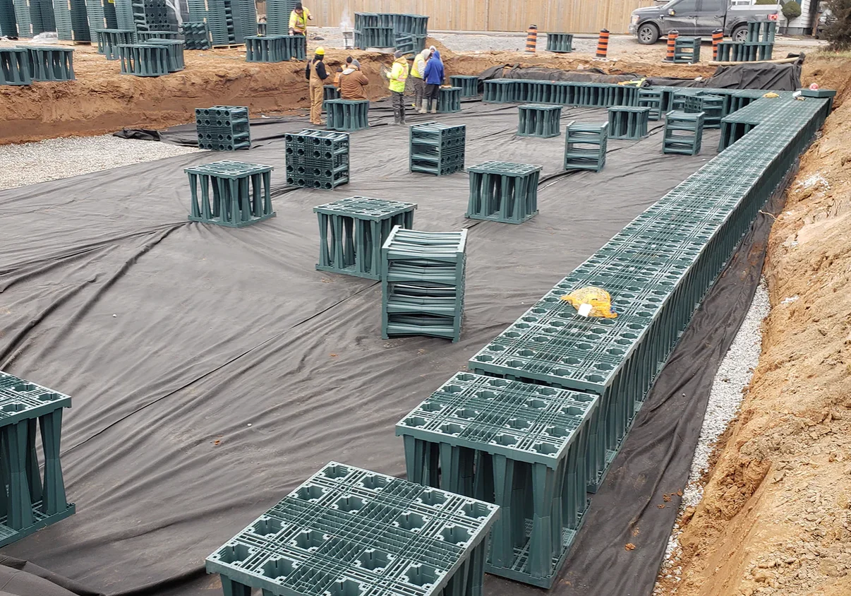 Green plastic water retention system installation.